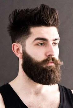 Verdi beard style with a full, rounded beard and styled moustache