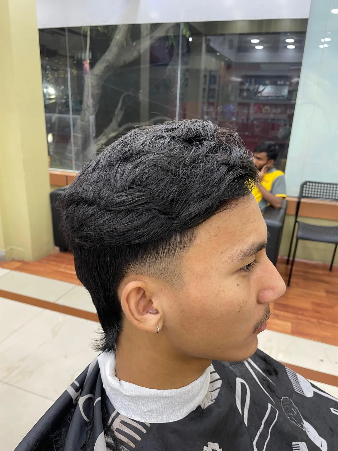 Men's haircut finished with a taper fade at Express Cuts Men's Salon, KR Puram
